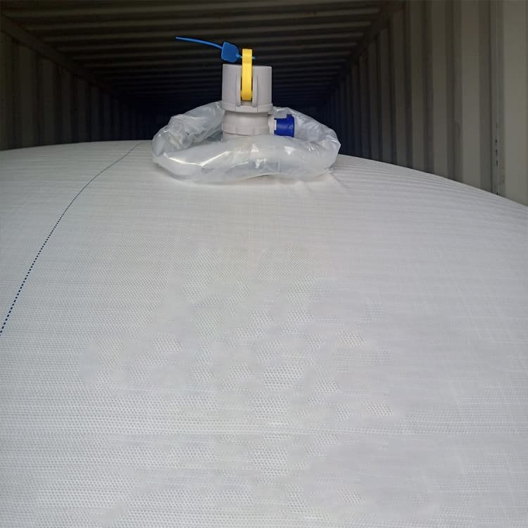 A detailed view of a flexitank being loaded, showcasing the process and equipment involved in the operation.